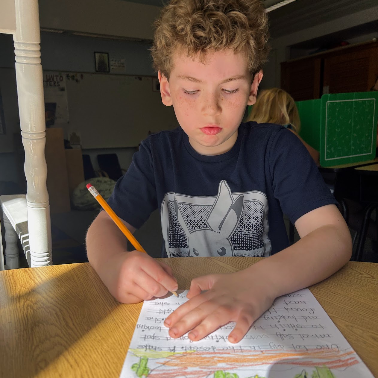 Student writes an essay